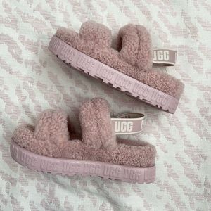 Pink oh fluffita UGG. NEVER WORN, BRAND NEW.